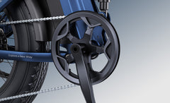 Close-up of a motorcycle chain and sprocket with a blurred background - Engwe Engine Pro 3.0 Boost Folding Electric Bike