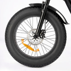 Close-up of a Ridstar Q20 Mini Electric Bike wheel with a white background