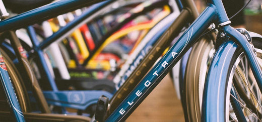 Row of electric bikes on display at Pogo Cycles e bike store