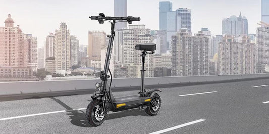 Modern electric scooter with seat on city street, urban skyline in background, Pogo Cycles