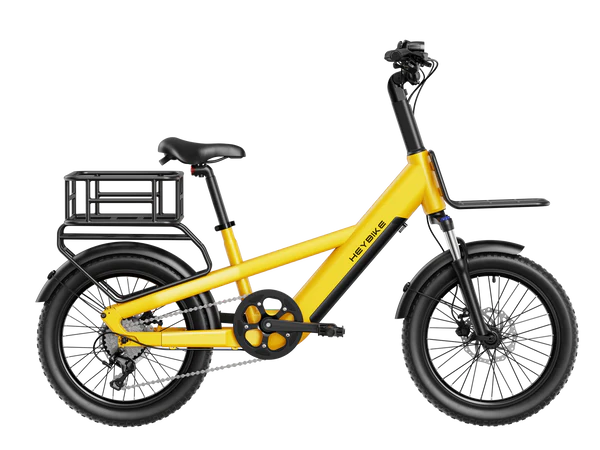 Yellow Heybike EC Compact Sport Electric Bike with a black seat and basket on a white background = Pogo Cycles, Ireland
